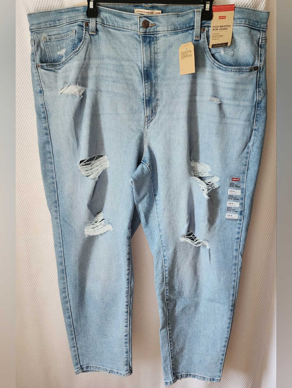 Levi's Light Blue Distressed High Rise Mom Jeans